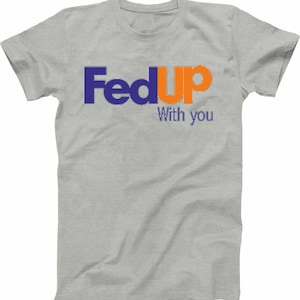 May include: Gray t-shirt with the text "FedUp" in blue and orange letters. The text "With you" is in smaller blue letters below the main text.