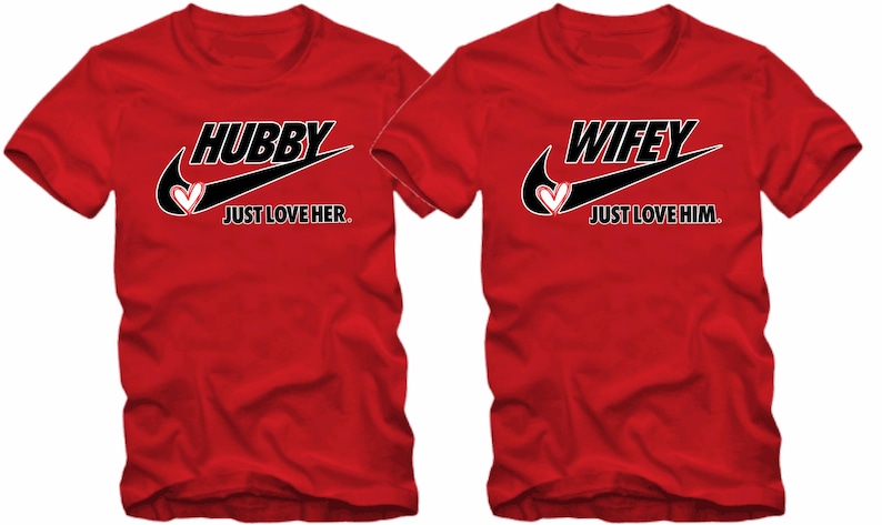 May include: Two red t-shirts with a black Nike swoosh and the words "Hubby Just Love Her." and "Wifey Just Love Him."
