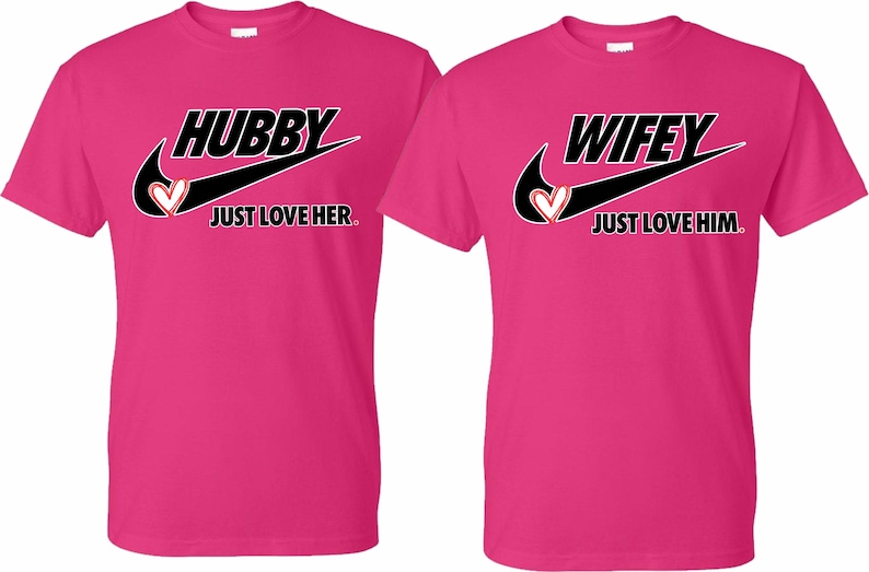 May include: Two pink t-shirts with a black Nike swoosh and the words "Hubby Just Love Her" and "Wifey Just Love Him" printed on them.