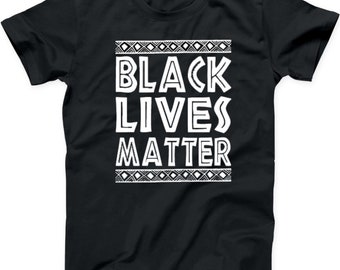 May include: Black t-shirt with a white graphic that says "Black Lives Matter" with a tribal-inspired design above and below the text.