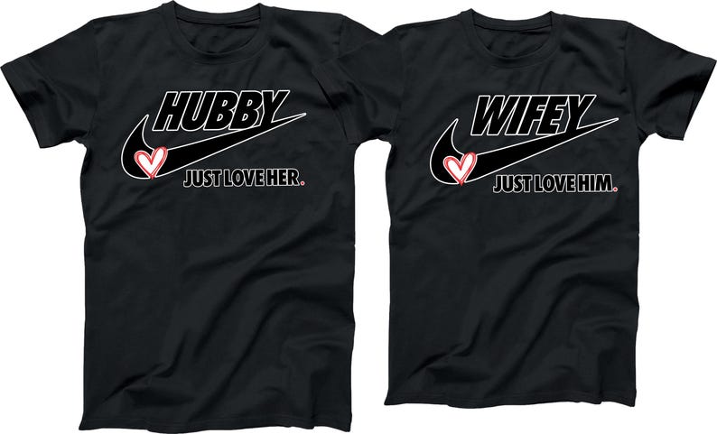 May include: Two black t-shirts with a white Nike swoosh and a red heart. The left shirt says "Hubby Just Love Her." The right shirt says "Wifey Just Love Him."