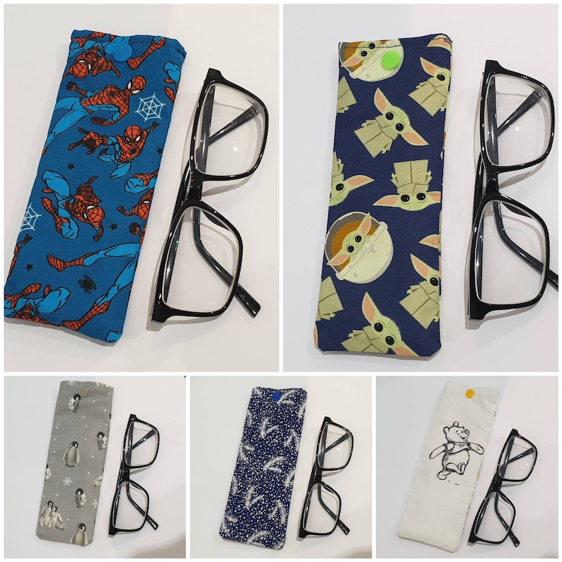 May include: Six different eyeglass cases with various patterns and colors. Each case is made of fabric and has a zipper closure. The cases are paired with black eyeglasses.