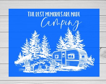 May include: A blue and white illustration of a camper, two chairs, and a campfire in a forest. The text "The best memories are made camping" is at the top of the image.