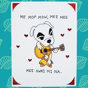 以下が含まれることがあります： 黄色いギターを弾く漫画の犬が描かれた白いグリーティングカード。犬には黒いマーキングがあり、赤いハートのアクセントに囲まれています。カードのテキストは「ME MOP MOW、MEE MEE」と「MEE GWEI MI NA」と書かれています。