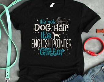 May include: Black t-shirt with white text that reads "It's not dog hair, it's English Pointer glitter". The text is surrounded by small white stars. A small white dog silhouette is next to the word "it's".