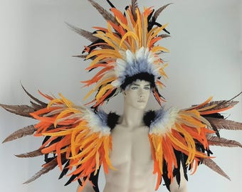 May include: A colorful feather headdress and shoulder piece set. The costume features a mix of orange, yellow, black, brown, and white feathers. The headdress sits atop a black band, and the shoulder piece has a wing-like design.