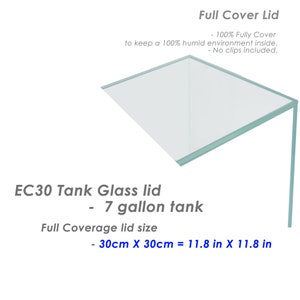 May include: A clear glass lid for a 7-gallon tank. The lid is 11.8 inches by 11.8 inches and is designed to provide full coverage for the tank. The lid is labeled "EC30 Tank Glass lid - 7 gallon tank".