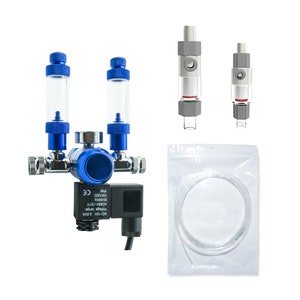 May include: A blue air filtration system with two clear glass filters, a silver knob, and a black solenoid valve. The system is connected to a clear plastic tube. The system also includes two smaller silver air filters with red accents.