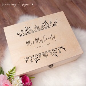 May include: A wooden keepsake box with a floral design and the text "Mr & Mrs Candy 7th April 2020".