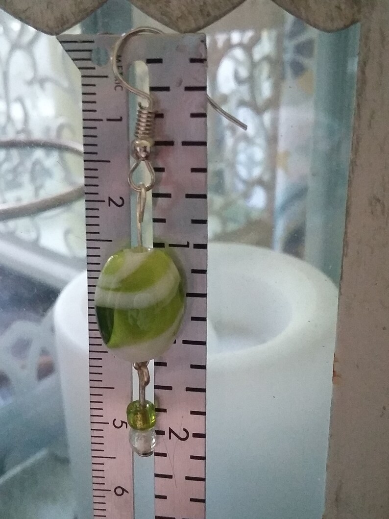 Green and white glass dangle earrings