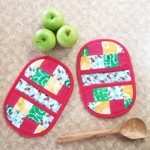 Double Pocket Potholders are 6 1/2 9 1/2 inches.