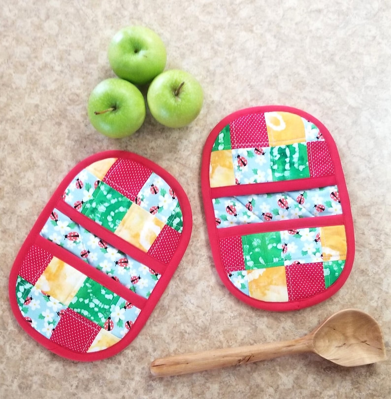 Double Pocket Potholders are 6 1/2 9 1/2 inches.