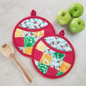 Round Potholders are 7 1/2 inches in diameter.