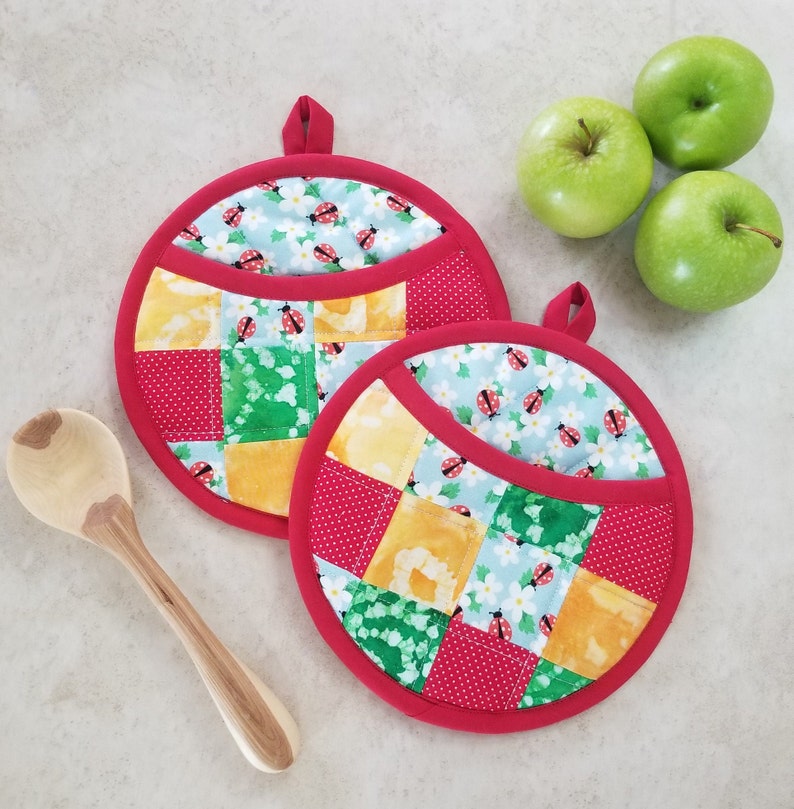Round Potholders are 7 1/2 inches in diameter.
