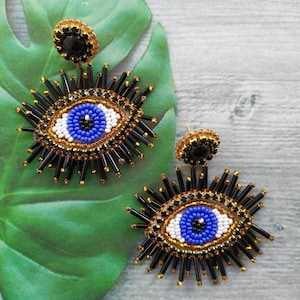 Gold & black evil eye earrings. 25th birthday gift for her. 5th anniversary gift. 30th birthday gift.