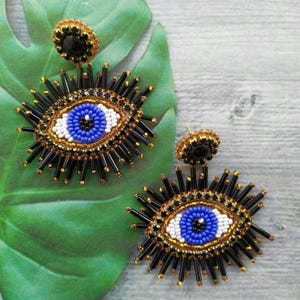 Böses Auge Ohrringe in Gold und Schwarz. 25.Geburtstagsgeschenk für 25. Geschenk zum 5. 30.Geburtstag Geschenk.