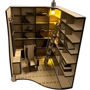El kit completo Book Nook Intrigue in The Library viene con pegamento y adornos en miniatura de resina 3D.