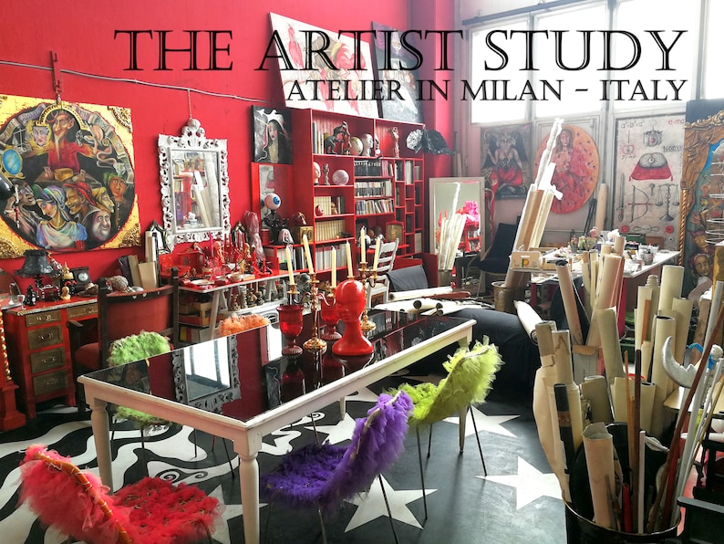 May include: A red room with a black and white tiled floor. The room is decorated with paintings, sculptures, and other art objects. There is a table with four chairs in the center of the room. The text "THE ARTIST STUDY ATELIER IN MILAN - ITALY" is displayed at the top of the image.