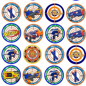 May include: A sheet of circular stickers with Nerf gun designs, bullseye targets, and the word "NERF". Some stickers have "HAPPY BIRTHDAY" text. The color palette includes blue, orange, yellow, and white.