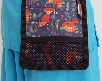 May include: A black fabric utility belt with a red panda print and a mesh pocket. The belt has a black strap and a silver carabiner clip.