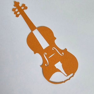 May include: An orange paper cutout of a violin. The violin is a musical instrument with a long neck and a rounded body.