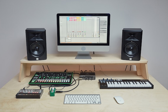 studio monitors on desk