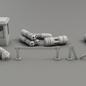 May include: A set of miniature gray plastic model buildings and barriers. The set includes a small building with a window, a set of barriers, a set of railings, and a set of cylindrical objects.