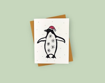 Handprinted linocut Christmas penguin card - 100% recycled paper and sustainable ink