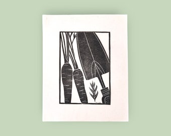 Handprinted linocut carrots and trowel