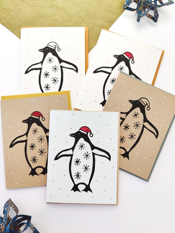 Handprinted linocut Christmas penguin card