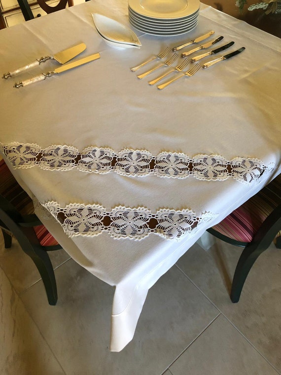white cloth table covers