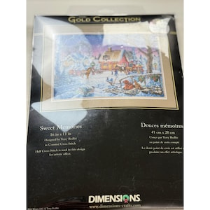 May include: The Gold Collection Sweet Memories counted cross stitch kit by Dimensions. The packaging features a winter scene with a house, horses, and people in the snow. It measures 16 inches by 11 inches and includes half cross stitch details.