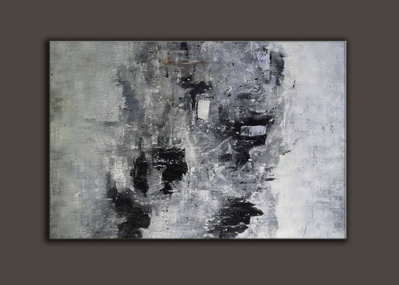May include: Abstract painting with black and grey brushstrokes on a white canvas. The painting has a textured surface and a modern style.