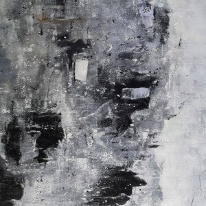 May include: Abstract painting with black and grey paint strokes on a white canvas. The painting has a textured look and feel.
