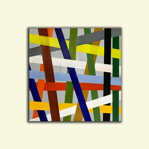 May include: Abstract painting with a geometric design of intersecting lines in various colors, including yellow, red, blue, green, brown, and white.