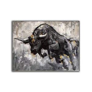 May include: A black bull charging forward with a gray and white background. The bull is painted in a textured style with gold accents.