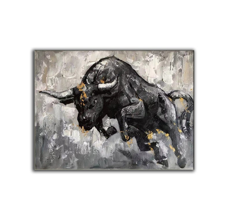 May include: A black bull charging forward with a gray and white background. The bull is painted in a textured style with gold accents.