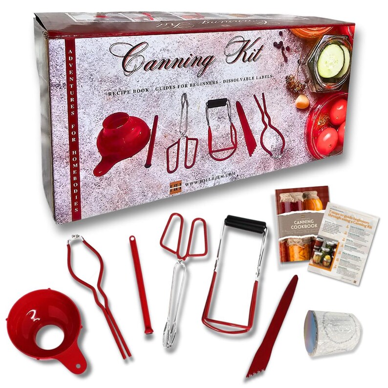 May include: A red box with the text "Canning Kit" and a variety of canning tools, including a funnel, tongs, jar lifter, and a jar lid lifter. The box also includes a recipe book and dissolvable labels.