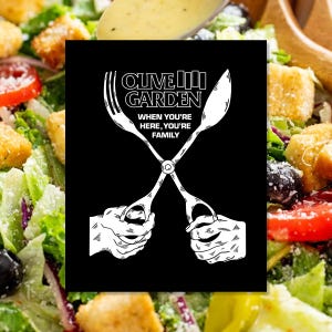 May include: Black square graphic with the Olive Garden logo, a fork and spoon crossed like scissors, and the text "WHEN YOU'RE HERE, YOU'RE FAMILY." The image is set against a background of a fresh salad.