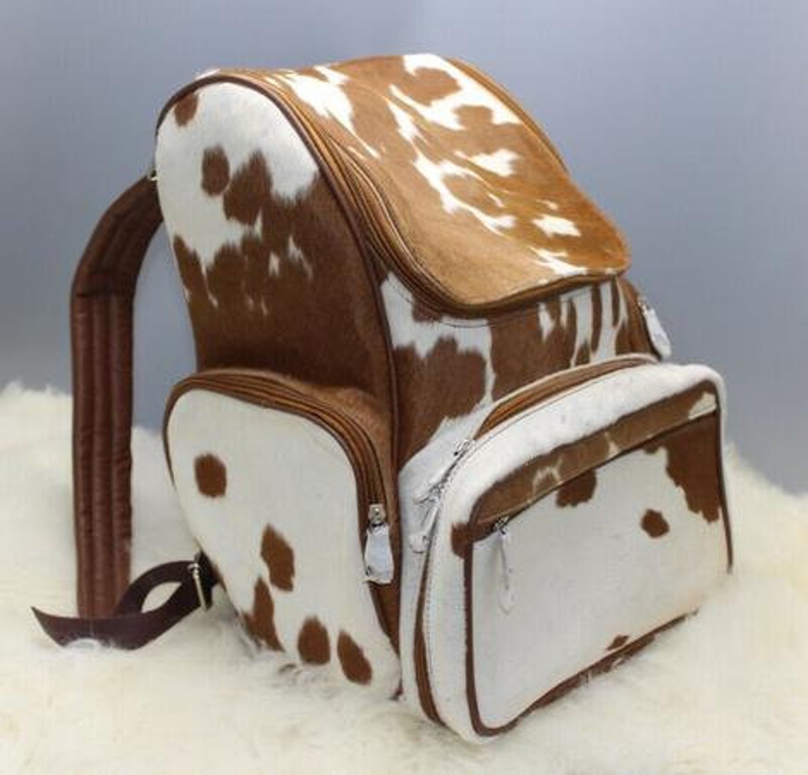 cowhide backpack with fringe