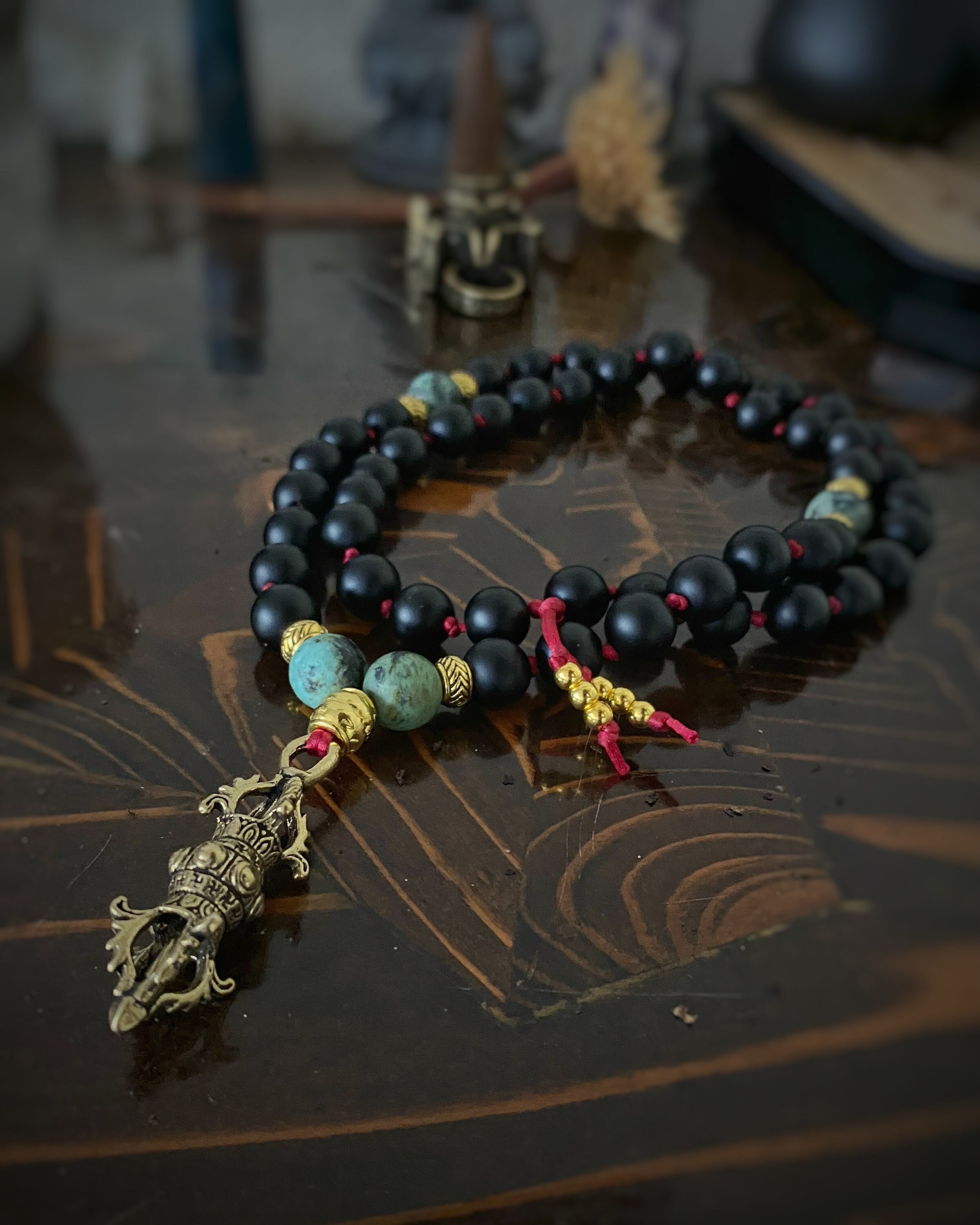 Golden Buddha Amulet on African Turquoise prayer beads mala bracelet main image 0