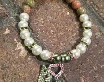 Pulseira elástica AKA feita à mão