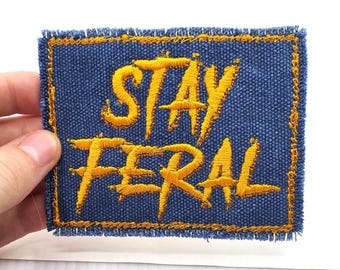 Stay Feral Embroidered Patch: Gold on Denim Canvas