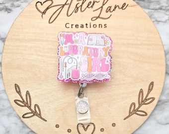 May include: Pink and white glitter badge reel with a pink and white design that says "I'm a Laboratory Girl".