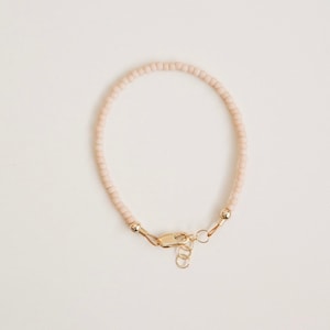 Baby bracelet- beaded baby girl bracelet pale rose 14k gold filled findings