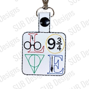 Wizard Love snap tab design in the hoop embroidery embroider keychain keyfob key fob heart wand broom magic magical inspired witch school