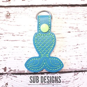 Mermaid tail tale snap tab in the hoop embroidery design vinyl embroider felt feltie mermaids nautical scale scales fin fish snaptab flipper