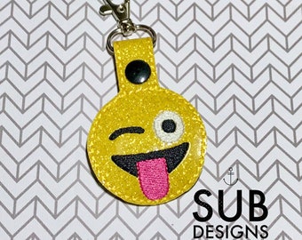 Emoji tongue snap tab design in the hoop embroidery embroider keychain keyfob key chain fob symbol smile smiling laugh face laughing wink