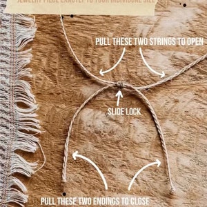 May include: Close-up of a slide lock closure on a brown cord. The cord is tied in a knot and has two strings that can be pulled to open and close the lock. The text "PULL THESE TWO STRINGS TO OPEN" and "PULL THESE TWO ENDINGS TO CLOSE" is written on the image.