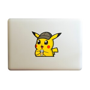 May include: A yellow Pikachu cartoon character wearing a brown detective hat and holding a brown paper cup. The character is on a white laptop.